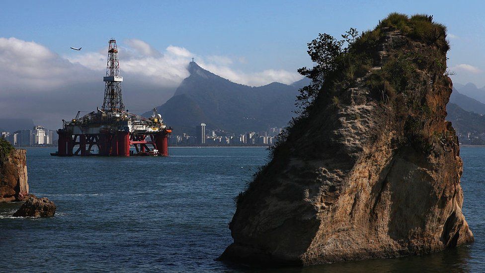 Oil drilling platform in front of Sugarloaf Mountain