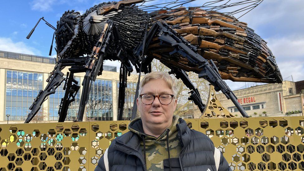 Michelle Polkinghorne stood in front of the bee sculpture