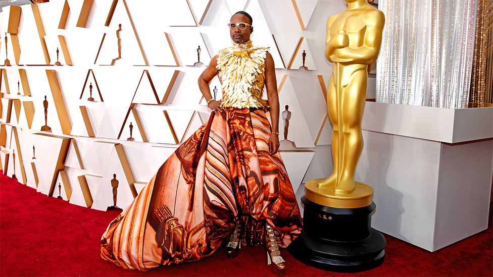 Billy Porter on the red carpet wearing a dress