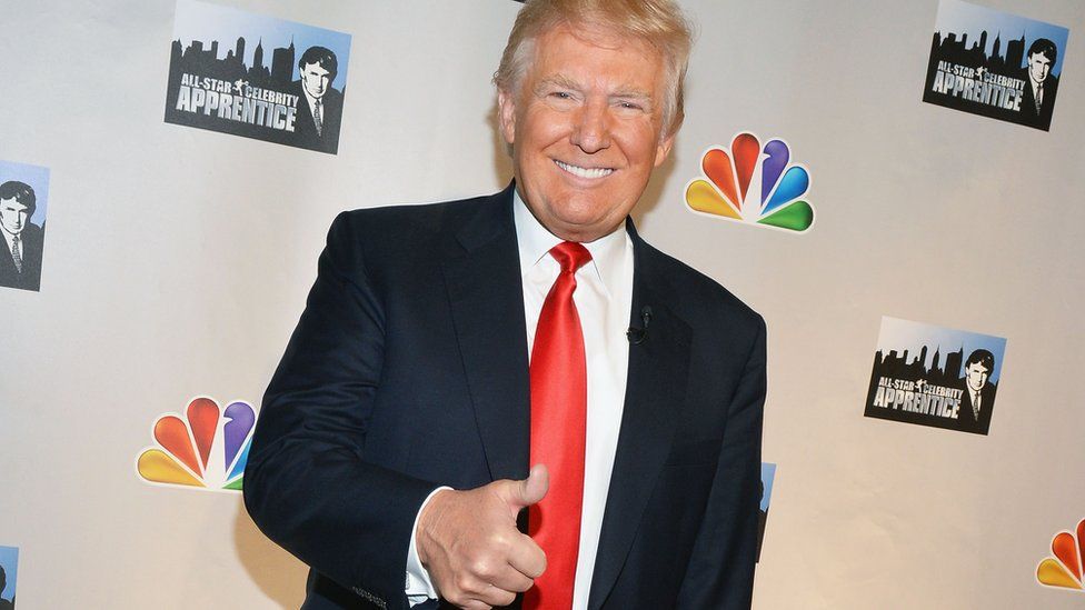 Donald Trump posing as host of The Apprentice