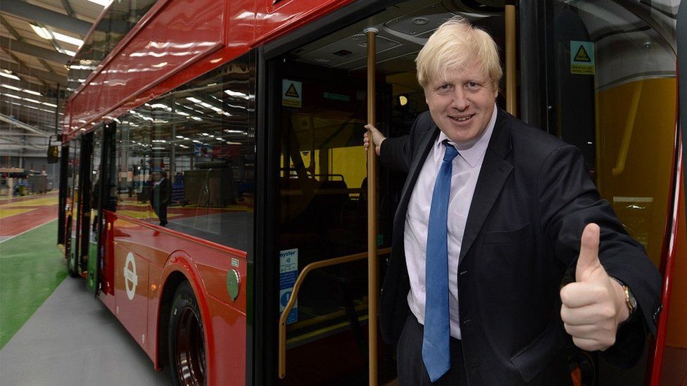 Boris Johnson with a Routemaster 'Boris Bus' at the Wrightbus factory