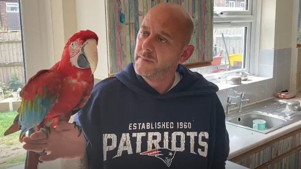 Peter Gosden and parrot