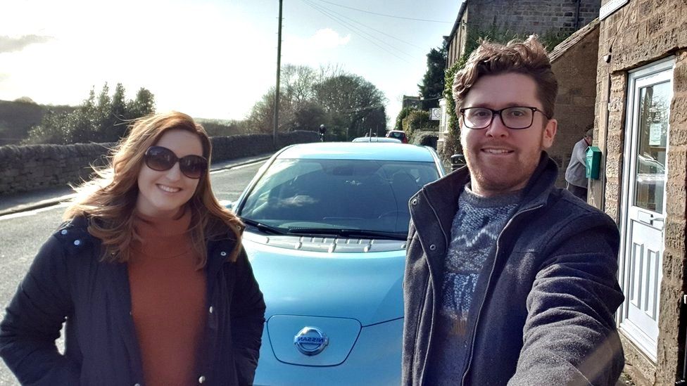 The Snowdens with their Nissan Leaf