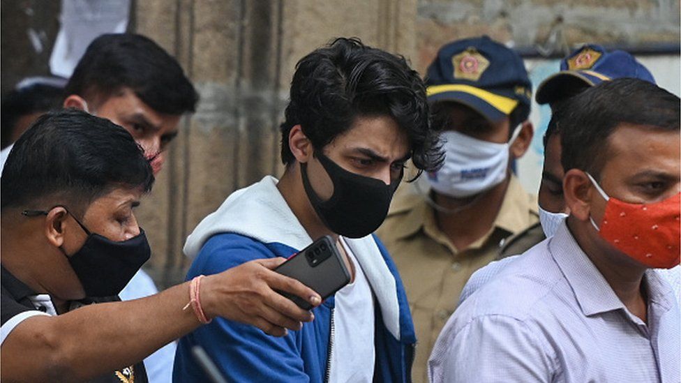Aryan Khan escorted to court by Narcotics Control Bureau (NCB) officials for a bail plea hearing in Mumbai on October 8, 2021