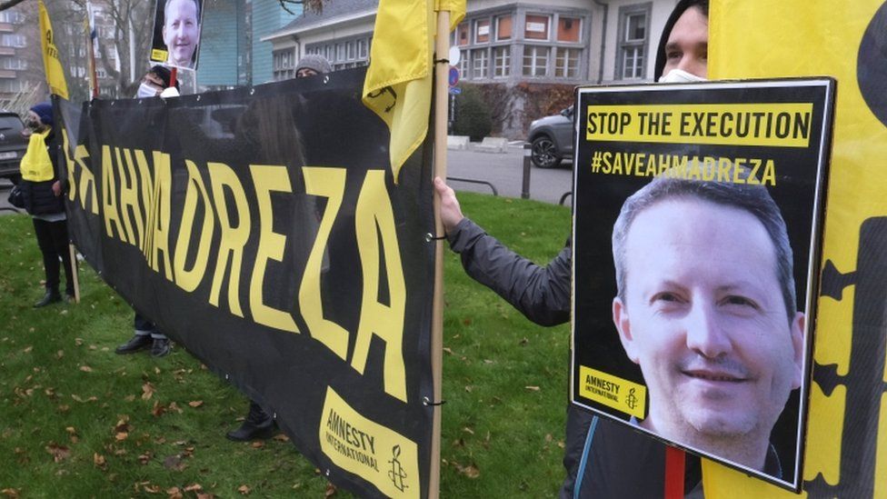 Amnesty International activists protest against the death sentence of Swedish-Iranian scientist Ahmadreza Djalali near the Iranian embassy in Brussels, Belgium