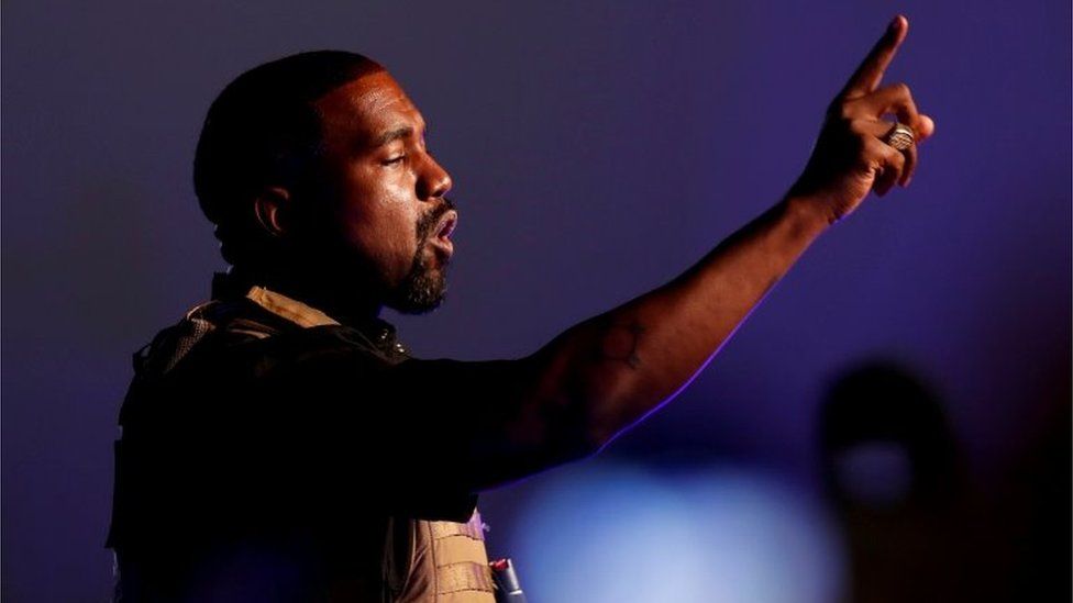 Kanye West gestures at his first rally for US president