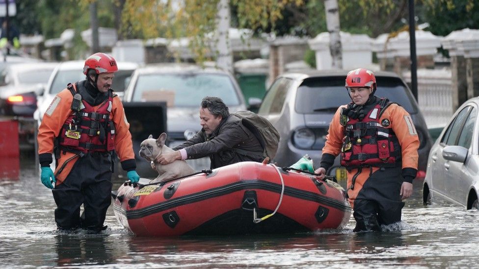 Stefano Calcagni being rescued by fire crews