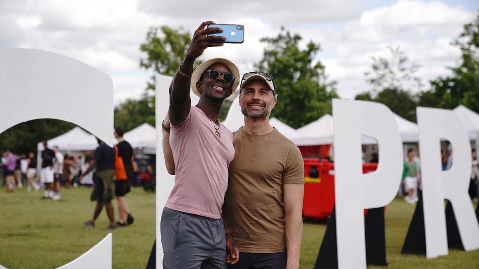 People take a selfie at UK Black Pride