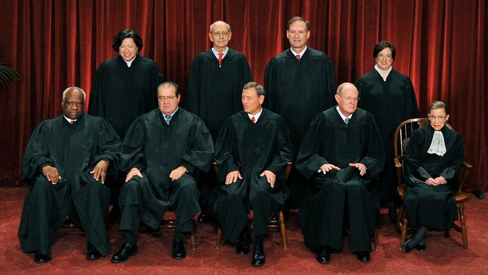 Front row (L-R): Associate Justice Clarence Thomas, Associate Justice Antonin Scalia, Chief Justice John G. Roberts, Associate Justice Anthony M. Kennedy and Associate Justice Ruth Bader Ginsburg. Back Row (L-R): Associate Justice Sonia Sotomayor, Associate Justice Stephen Breyer, Associate Justice Samuel Alito Jr. and Associate Justice Elena Kagan.