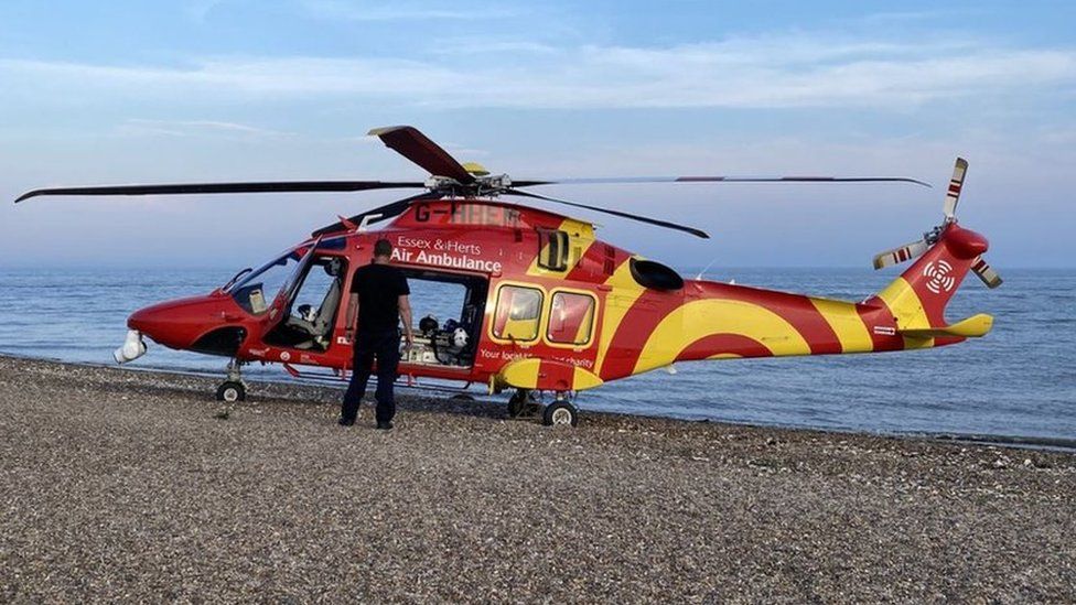 Air ambulance helicopter on beach