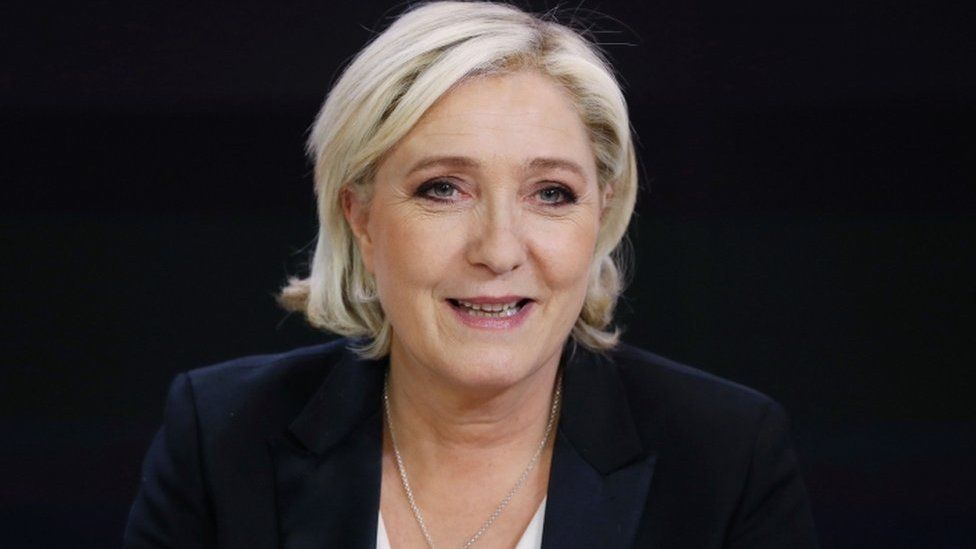 French presidential election candidate for the far-right Front National (FN) party Marine Le Pen waits before an interview on the set of the France 2 TV channel on 24 April, 2017 in Paris.