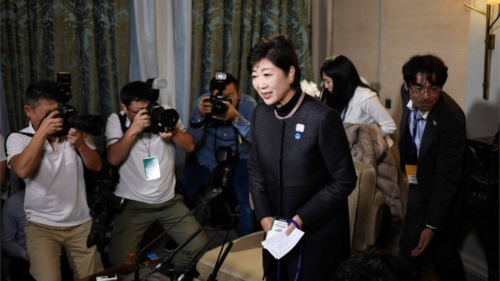 Yuriko Koike, governor of Tokyo, photographed submitting her vote on October 22 2017