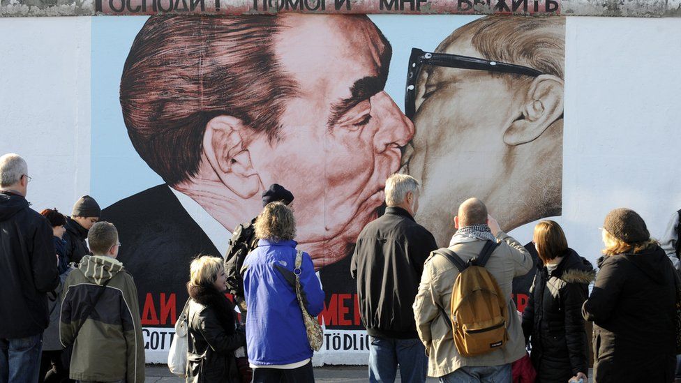 Painting in Berlin of a "fraternal kiss" between former Soviet leader Leonid Brezhnev and East German leader Erich Honecker