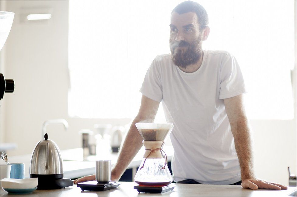 Nolan Hirte from Proud Mary with a Chemex coffee maker