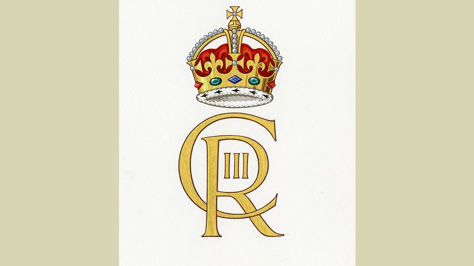 The cypher of King Charles III shows the letters C and R intertwined with III in the middle. A crown sits on top of the letters.