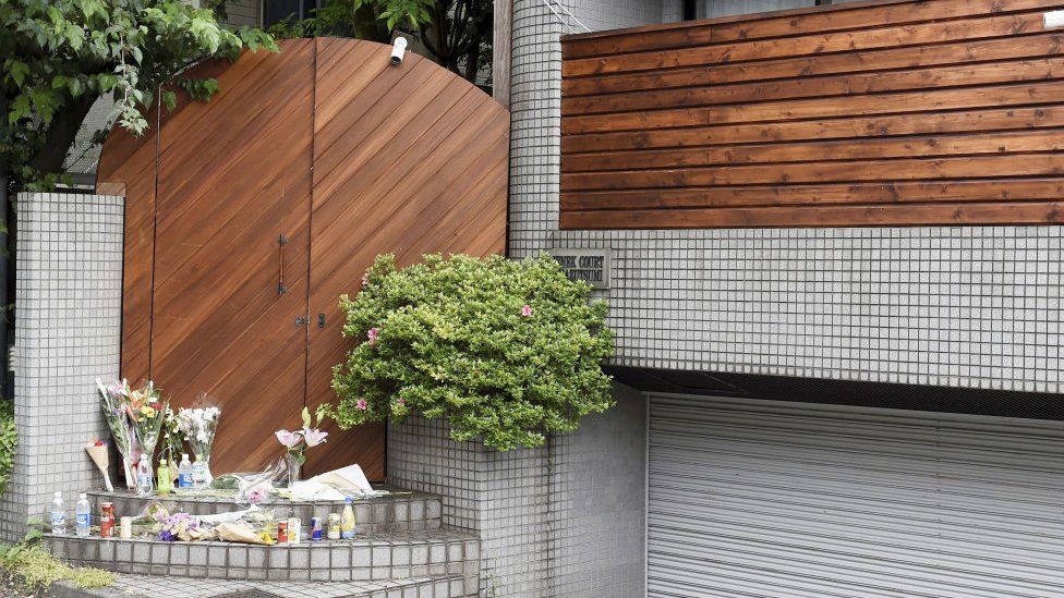Flowers are placed at a shooting location for the Netflix reality show "Terrace House" in Tokyo