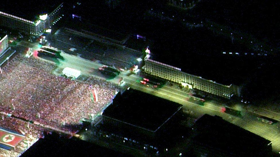 PYONGYANG, NORTH KOREA -- FEBRUARY 8, 2023: 02 Maxar night time satellite imagery -- closer view of missle laungers in the military parade in Kim Il Sung Square in Pyongyang, North Korea.. Please use: Satellite image (c) 2023 Maxar Technologies.