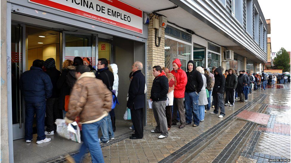 Unemployed queuing up at a Spanish job centre in Madrid