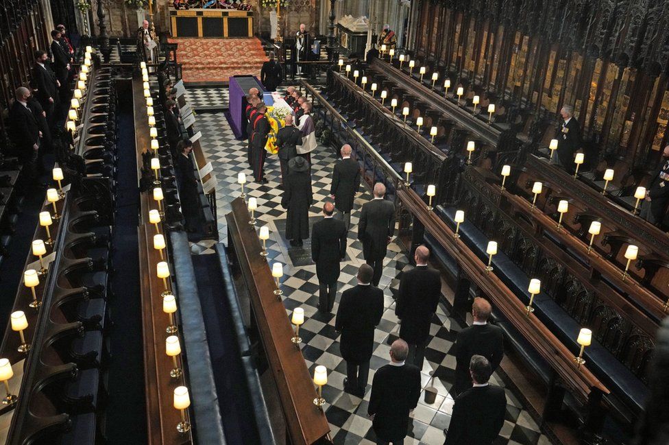Members of the royal family follow the coffin into St George's Chapel during the funeral of the Duke of Edinburgh, at Windsor Castle, Berkshire.