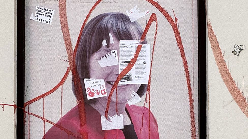 Poster of MP Jo Stevens defaced with graffiti and stickers