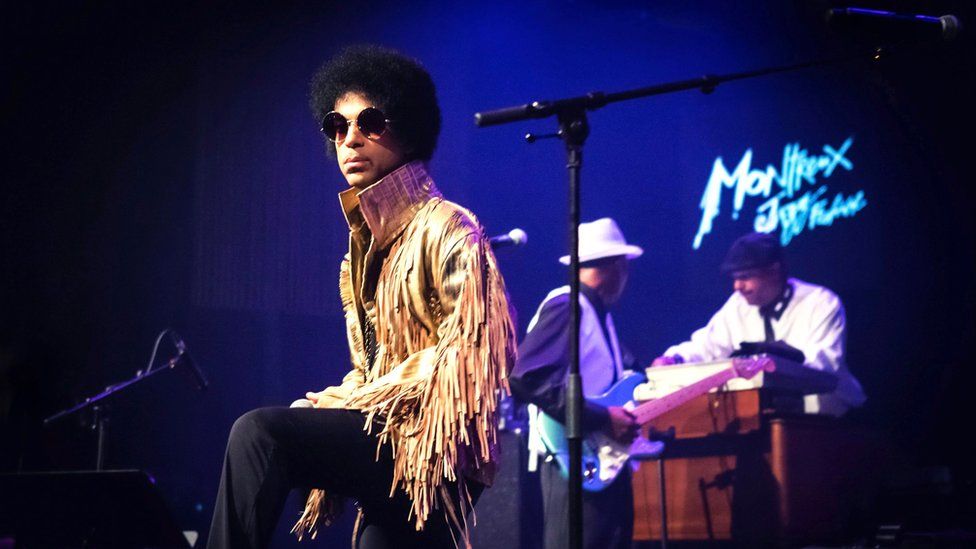An archive handout image made avialable on 21 April 2016 shows US musician Prince performing on the Stravinski Hall stage during the 47th Montreux Jazz Festival, in Montreux, Switzerland, 14 July 2013.