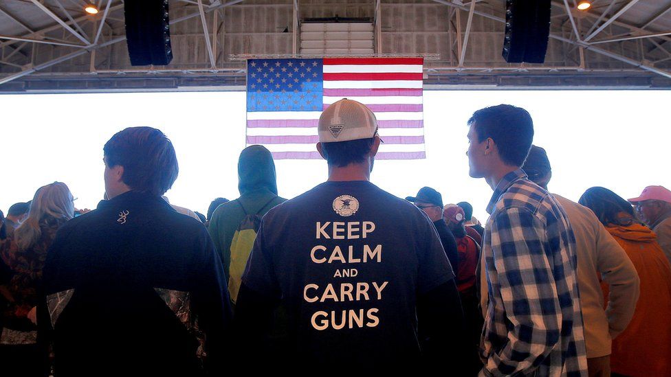 Supporters wait for a campaign rally with Republican presidential candidate Donald Trump to begin, Wednesday, Dec. 16, 2015