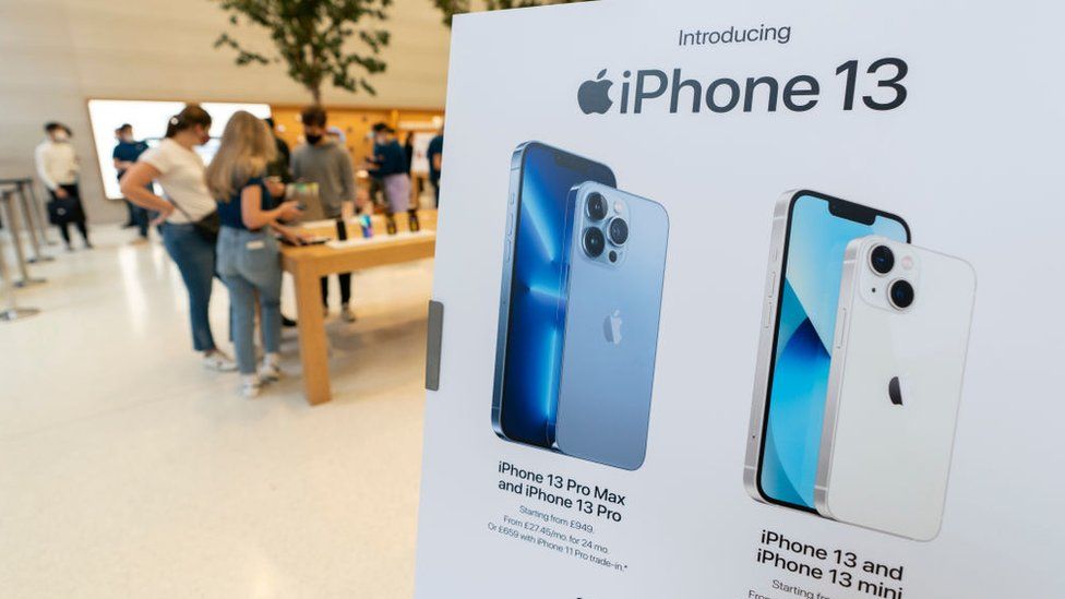 People attend the iPhone 13 launch at Apple's flagship Regent Street store in London