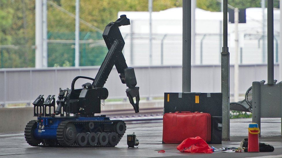 A remote-controlled robot for bombing disarming is on a track of the main station of the town of Chemnitz, eastern Germany on October 8, 2016