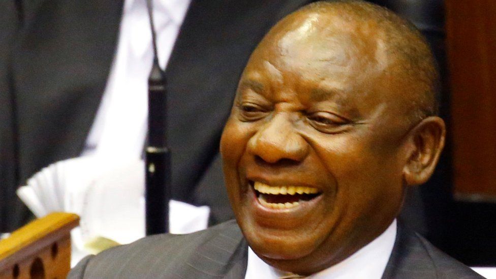 President of South Africa Cyril Ramaphosa smiles as he addresses MPs after being elected president in parliament in Cape Town, South Africa, February 15
