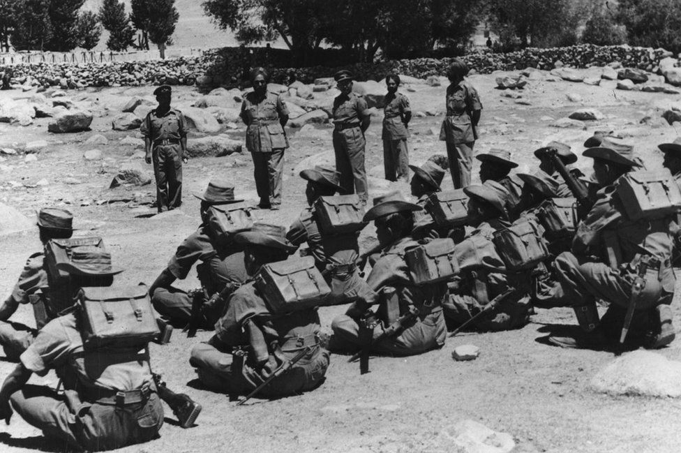 November 1962: Indian troops being inspected before leaving their posts in the Ladakh region of northern India during border clashes between India and China.
