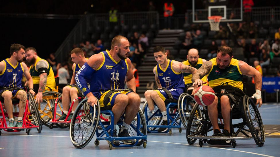 Wheelchair basketball players from Ukraine take on Team Australia during the 2023 Invictus Games in Düsseldorf