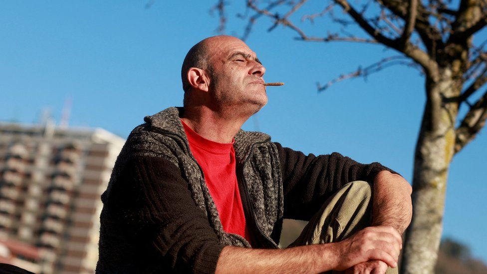 Man enjoying a cigarette in Bilbao