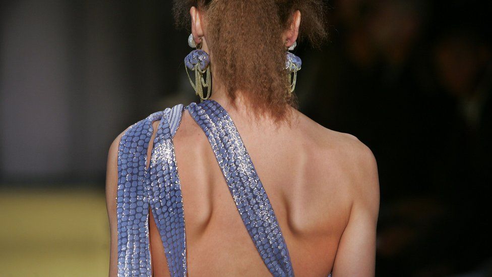 back of model with shoulder blades protruding