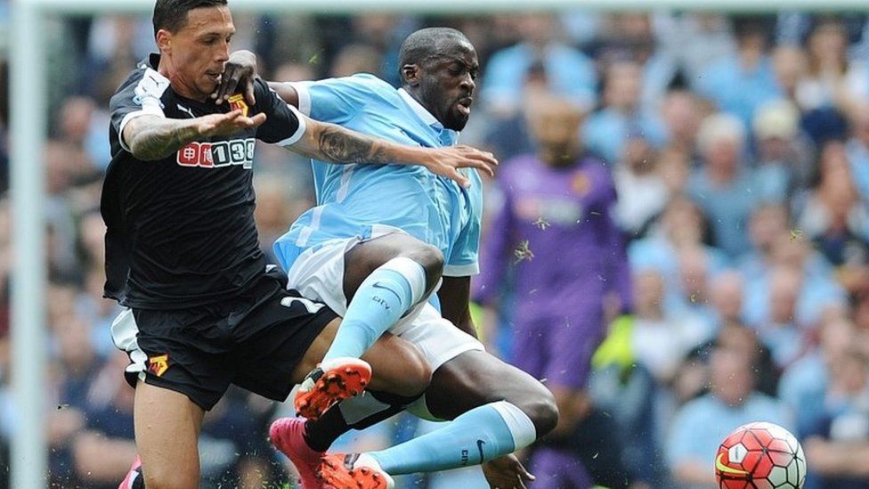 Manchester City's Yaya Toure (R) in action with Watford"s Jose Holebas (L) during the English Premier League soccer match between Manchester City and Watford at the Etihad Stadium, Manchester, Britain, 29 August 2015