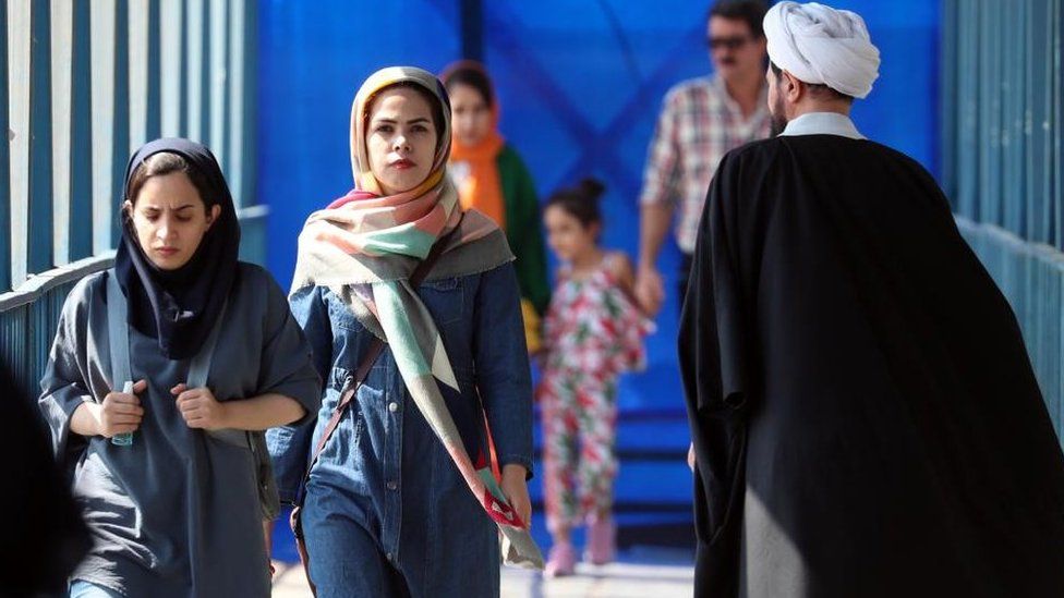 Two veiled Iranian women pictured in Tehran