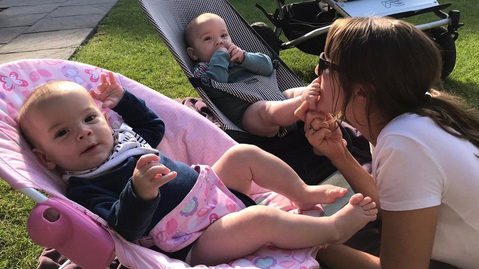 Emily Courtney with her twins in the sun
