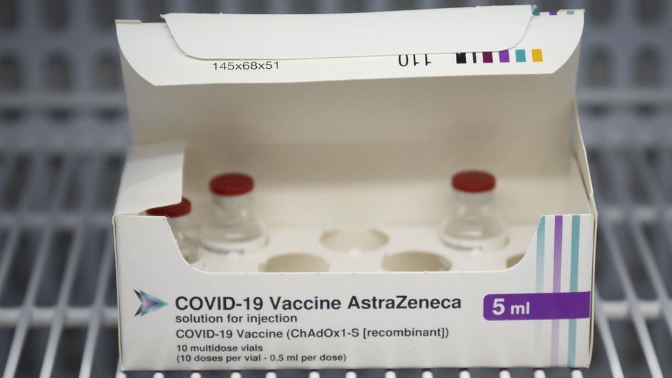 A box of AstraZeneca vaccine with several vials missing