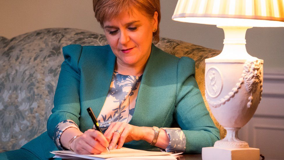 Nicola Sturgeon signing letter