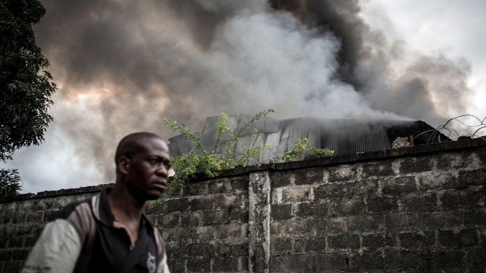 Smoke burning out of the electoral commission warehouse in Kinshasa