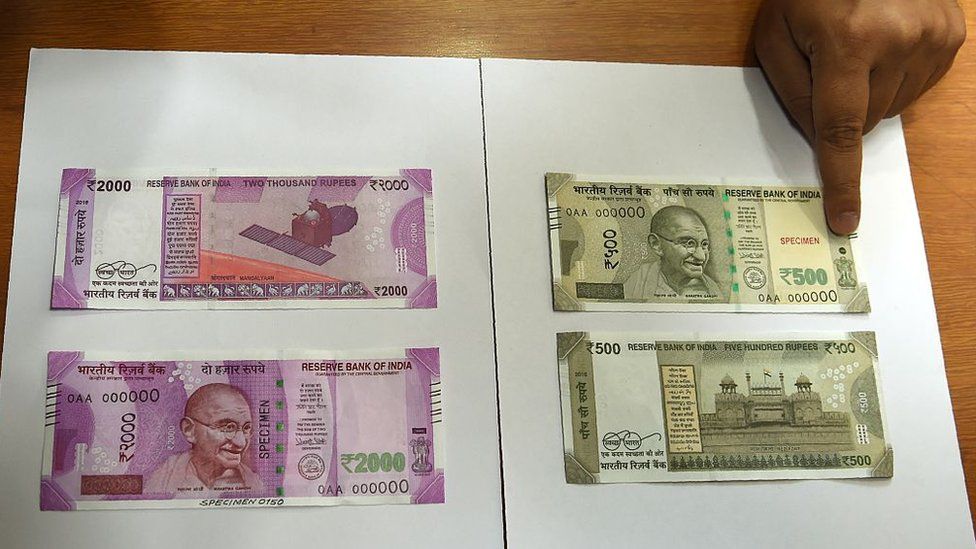 Samples of the new 500 and 2,000 rupee notes are displayed at the Reserve Bank of India headquarters in Mumbai