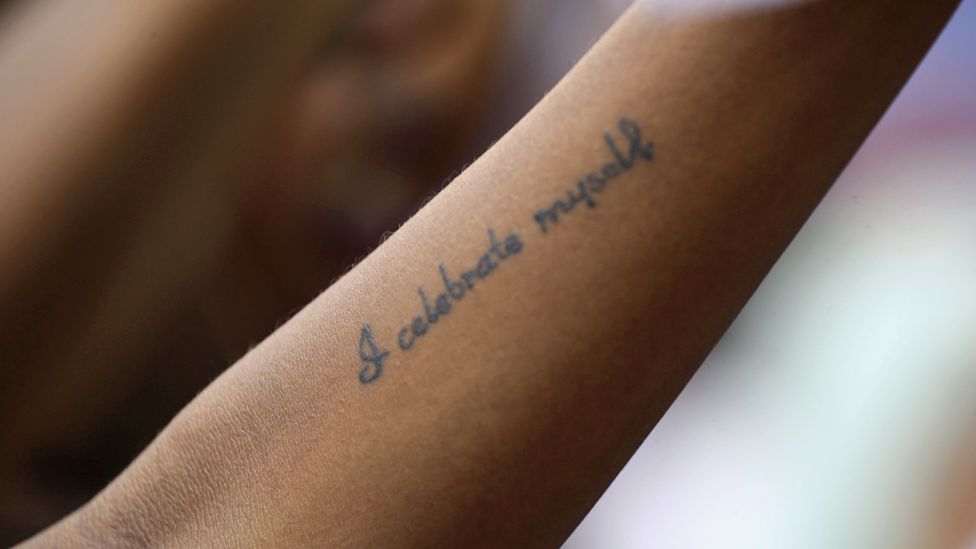 A woman with a tattoo saying "I celebrate myself" in Khartoum, Sudan - Sudan 8 March 2020