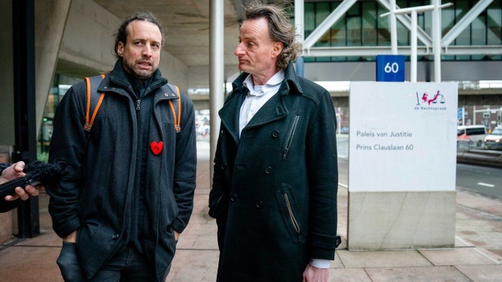 Lawyer Jeroen Pols (R) and Willem Engel of the protest group Viruswaarheid arrives at the Court of Appeal in The Hague, The Netherlands, 16 February 2021