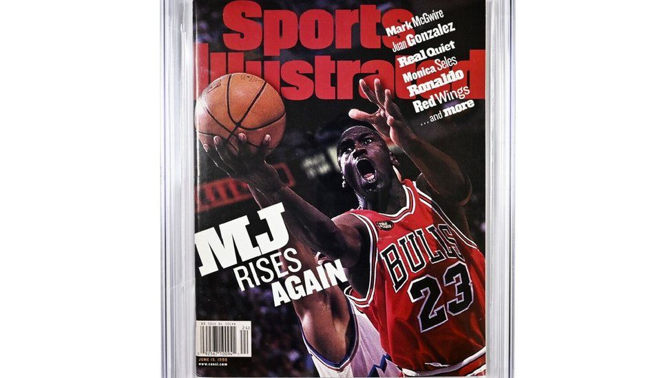 A graded copy of a June 1998 Sports Illustrated magazine, which features the jersey.