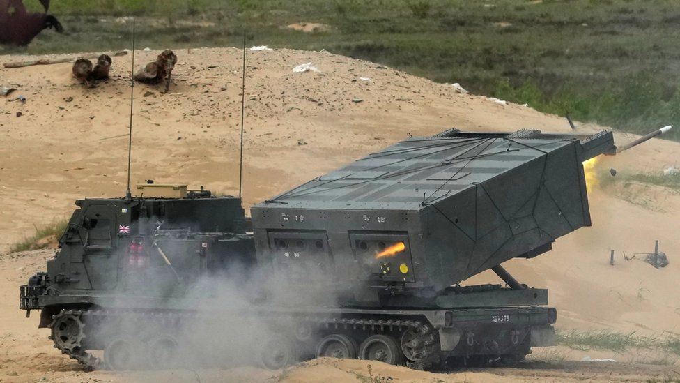 A British army M270 multiple-rocket system fires during a training exercise