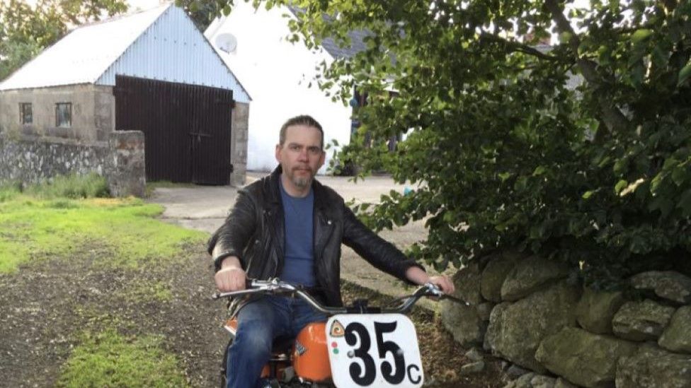 David Blayney sitting on a motorbike