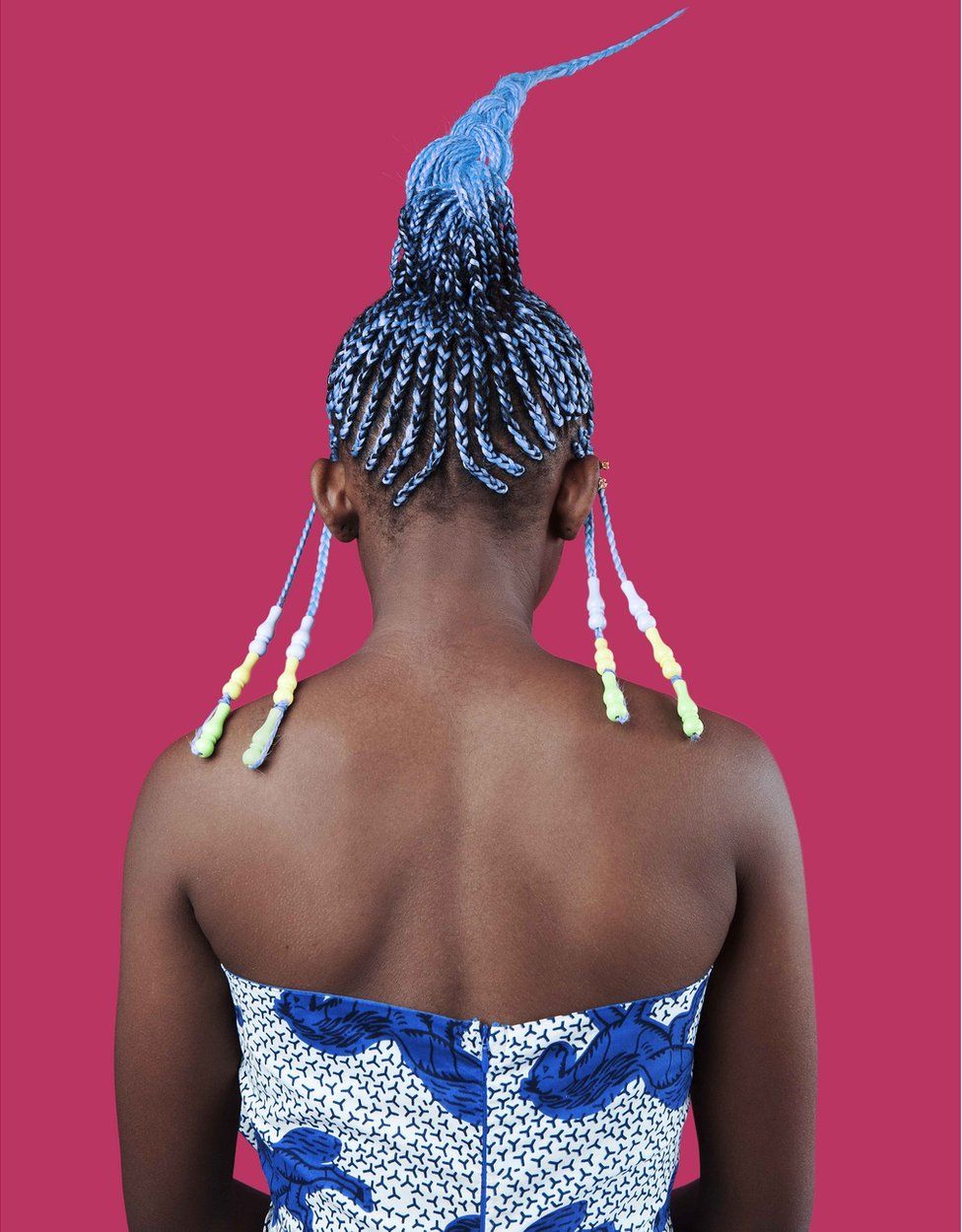Portrait by Medina Dugger showing African hair braiding