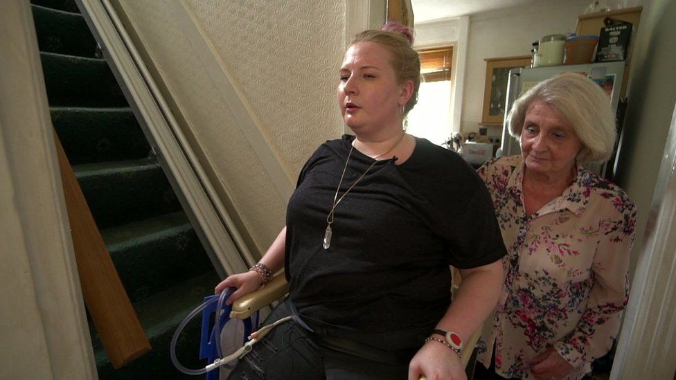 Catrina Farnell on stairlift with her mother Margaret