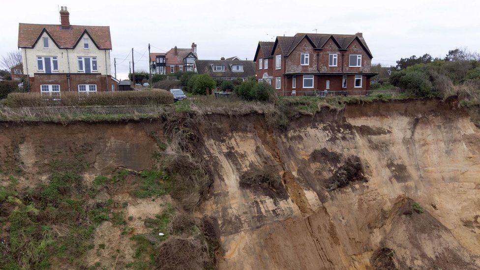 Cracks open up in Mundesley cliff top close to previous fall - BBC News