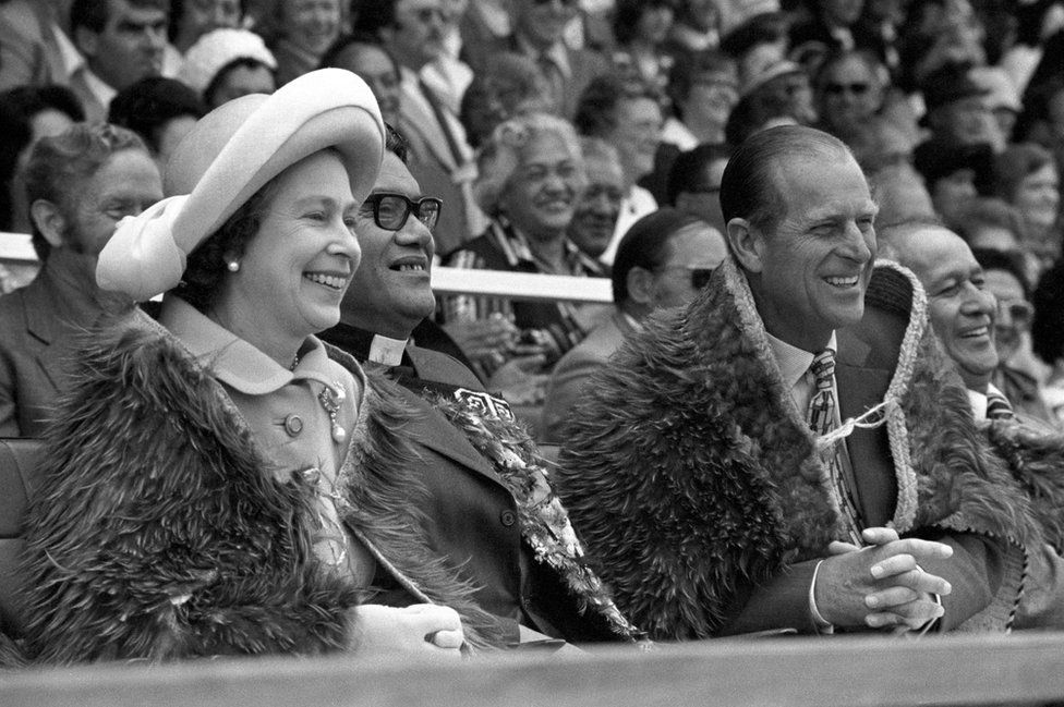 The Queen and the Duke of Edinburgh, both wearing Maori Kahu-Kiwi (Kiwi feather cloaks) at Rugby Park in Gisborne, on the North Island of New Zealand when they attended the opening of the Royal New Zealand Polynesian Festival as their Silver Jubilee Tour continues
