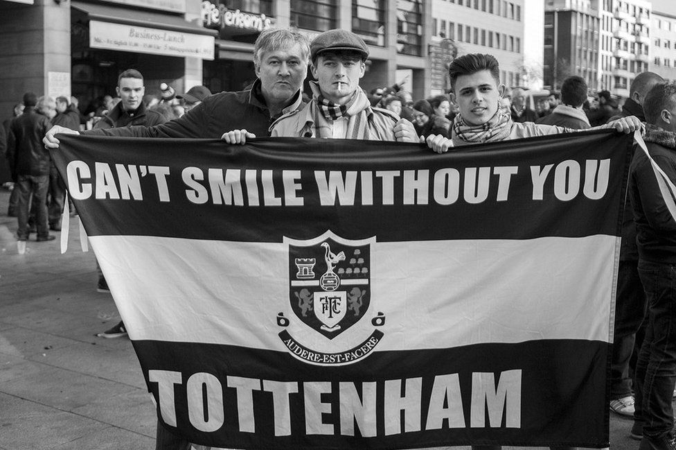 Tottenham fans with a flag